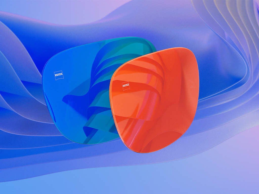Illustration 3D en images de synthèse de deux verres de lunettes de soleil à traitement miroir bleu et orange.