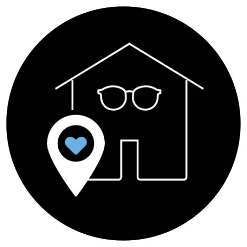 Une illustration montrant une visualisation de la localisation d’un opticien avec une paire de lunettes et un symbole de localisation sur une carte en forme de goutte d’eau inversée avec un cœur.