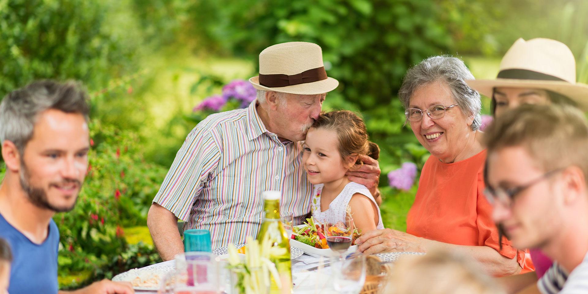 Lunch in the garden for multi-generation family