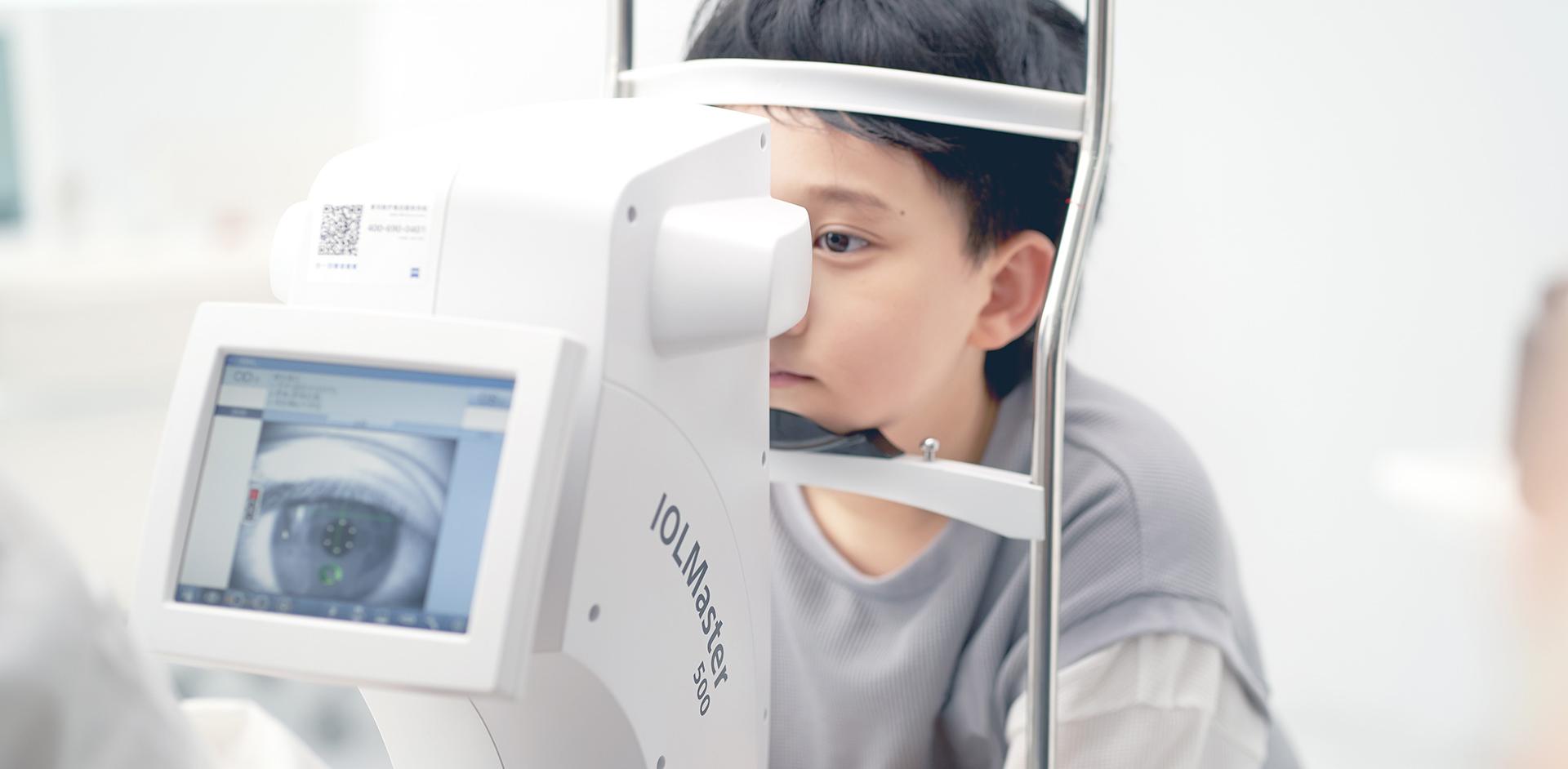 Young girl in eye examination room