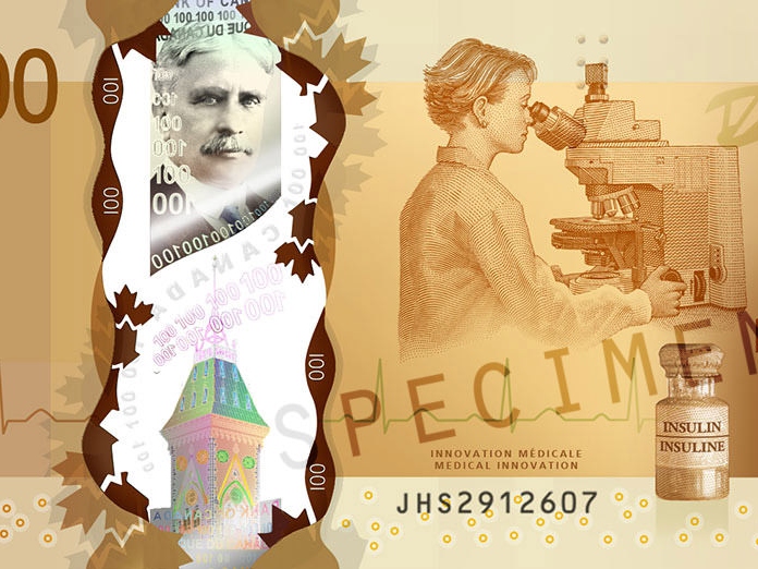 Close-up view of the Canadian $100 bill, showing a ZEISS microscope among other things.