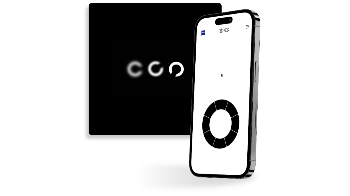 A smartphone with a screen of a ZEISS Online Vision Screening exercise, standing in front of a black square button showing circles of varying sharpness with an opening in different directions, commonly used at vision tests.